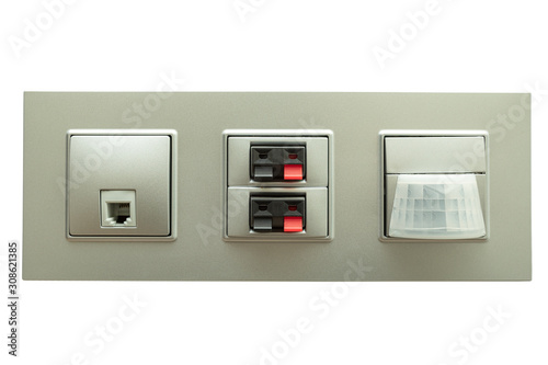 Multifunction outlet with an audio input, motion sensor and network socket