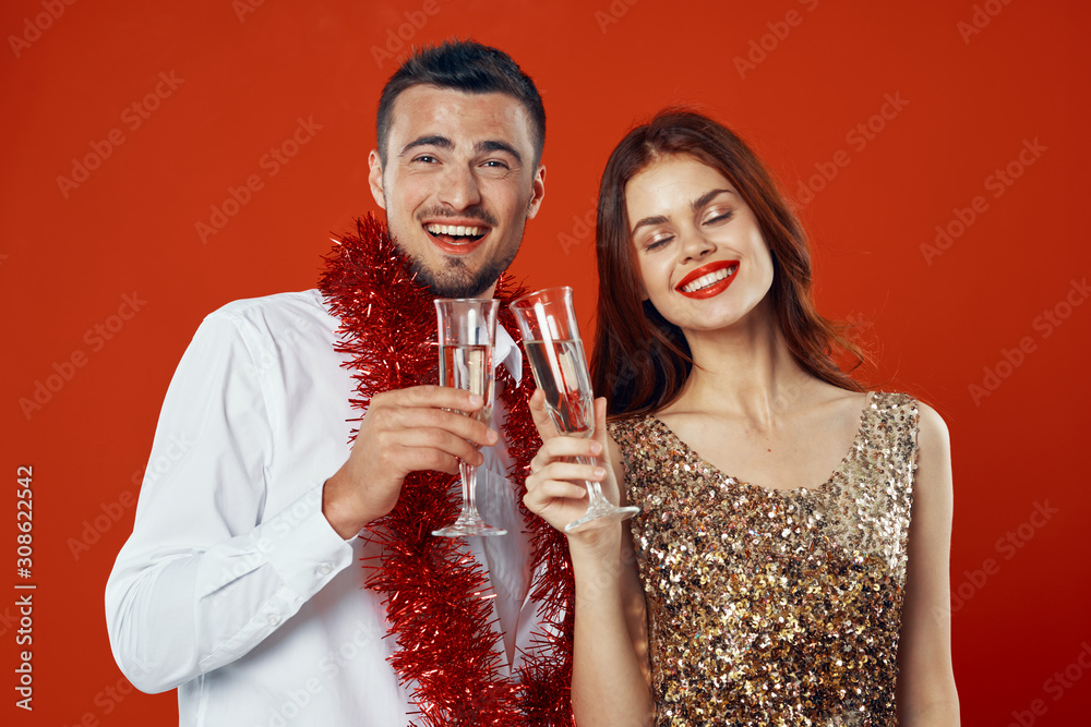 young couple celebrating with champagne young couple celebrating with champagne