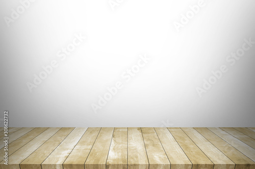 Wood table top with concrete wall background. Used for product placement or montage. 