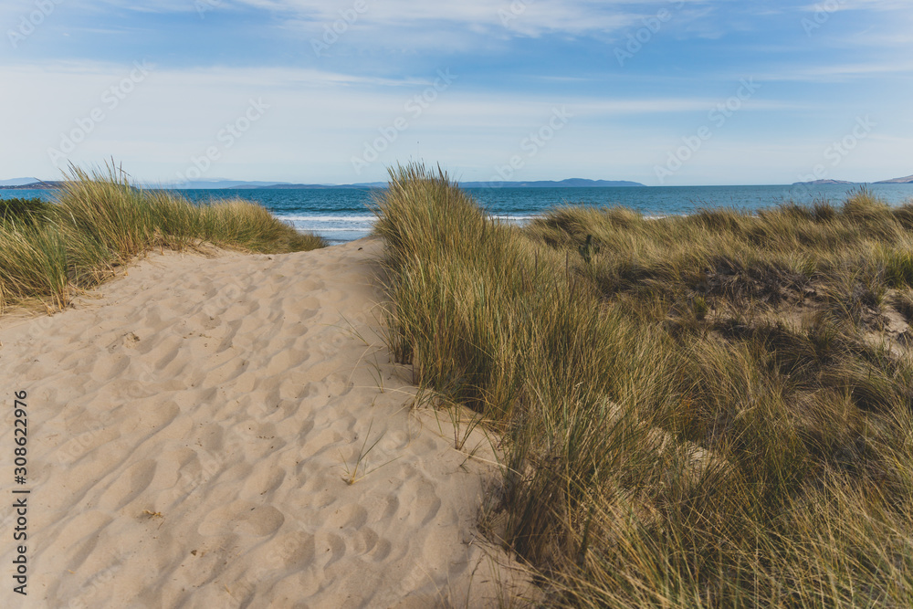 Seven Mile Beach in Tasmania, Australia on late spring day with no people Seven Mile Beach in Tasmania, Australia on late spring day with no people