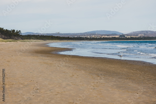 Seven Mile Beach in Tasmania  Australia on late spring day with no people
