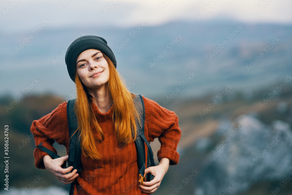 Naklejka premium young woman in mountains