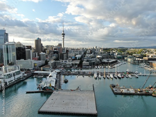 Viaduct Harbour, Auckland / New Zealand - December 9, 2019: The beautiful scene surrounding the Viaduct harbour, marina bay, Wynyard, St Marys Bay and Westhaven, all of New Zealand’s North Island photo