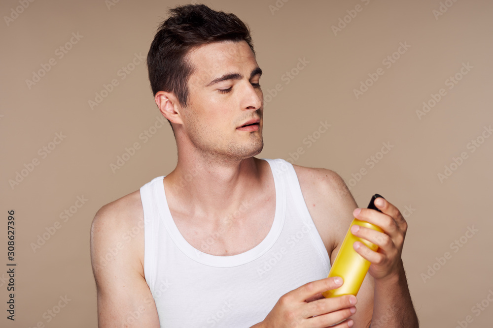 young man drinking orange juice young man drinking orange juice