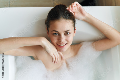 young woman relaxing in bath