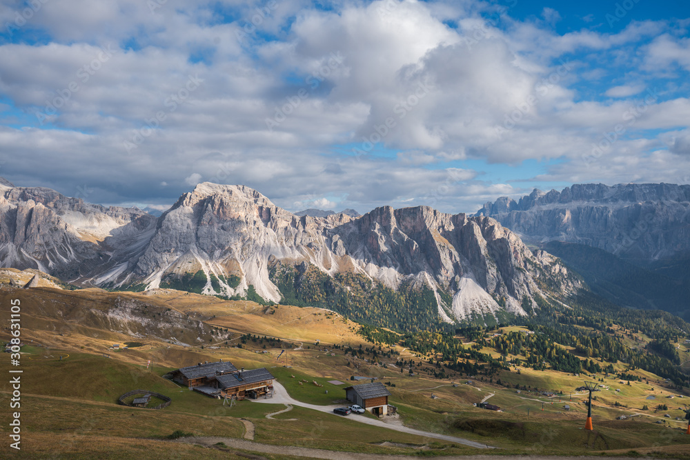 Sunset landscapes in Seceda with clouds and blue sky in Dolomites, South Tyrol, Italy