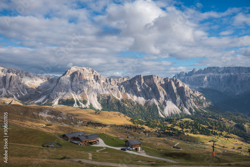 Sunset landscapes in Seceda with clouds and blue sky in Dolomites, South Tyrol, Italy