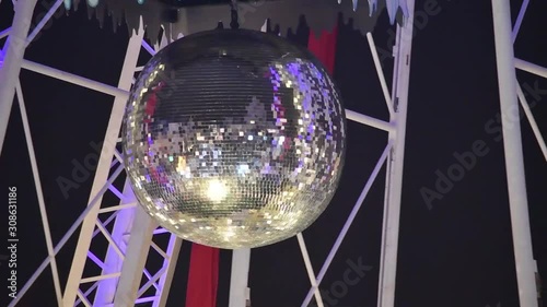 Mirrorball on ferris wheel in lille by christmas, close shot photo