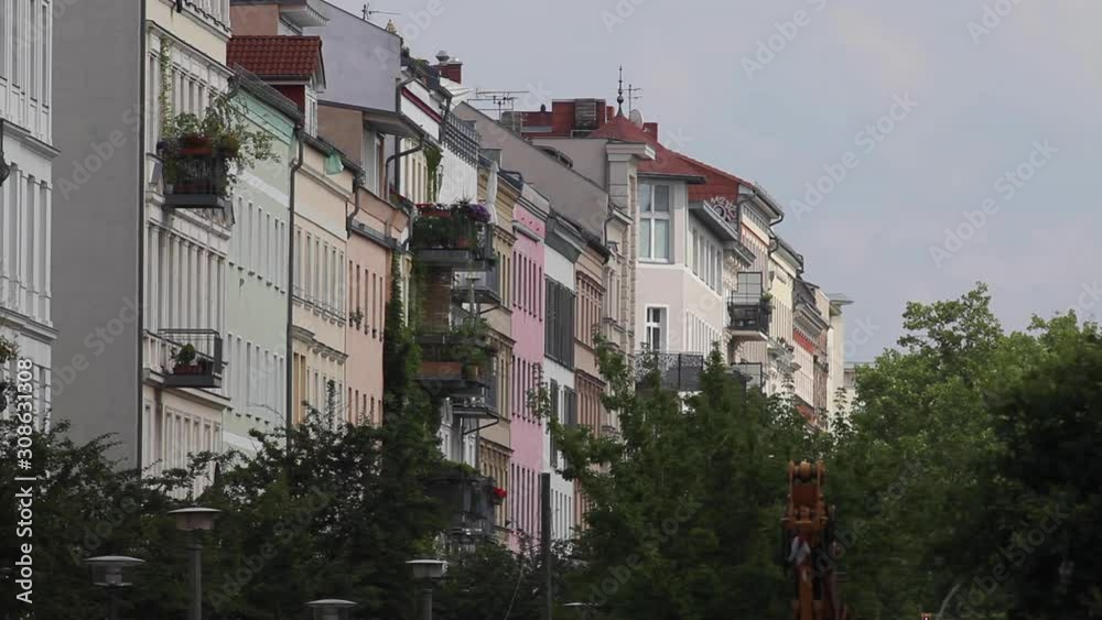 Front of old residential buildings in Berlin - Prenzlauer Berg / long lens shot Front of old residential buildings in Berlin - Prenzlauer Berg / long lens shot