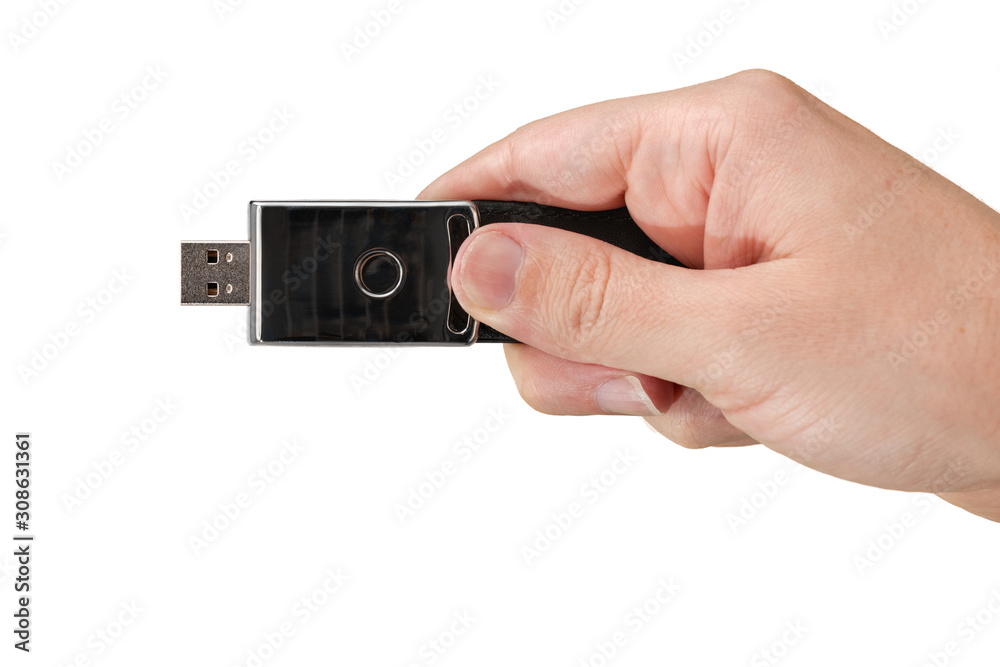 Black memory stick on hand with white background Black memory stick on hand with white background