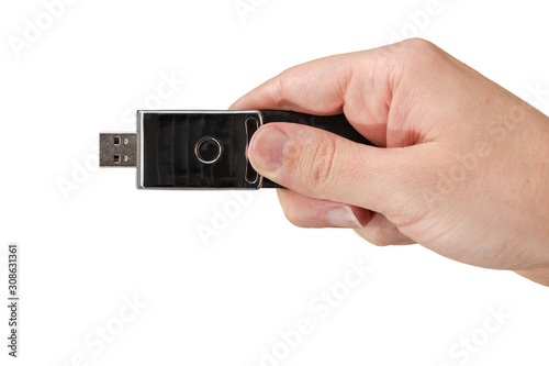 Wallpaper Mural Black memory stick on hand with white background Torontodigital.ca