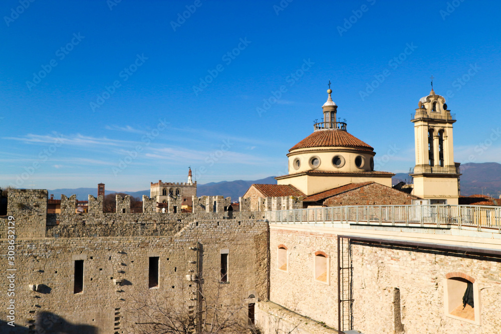 View of the medieval church Santa Maria delle Carceri and walls of emperor Ferdinand castle, Prato, Tuscany, Italy