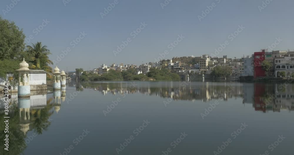 India city Udaipur reflects in the surrounding lake India city Udaipur reflects in the surrounding lake