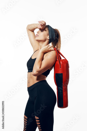 Sports woman boxing bag