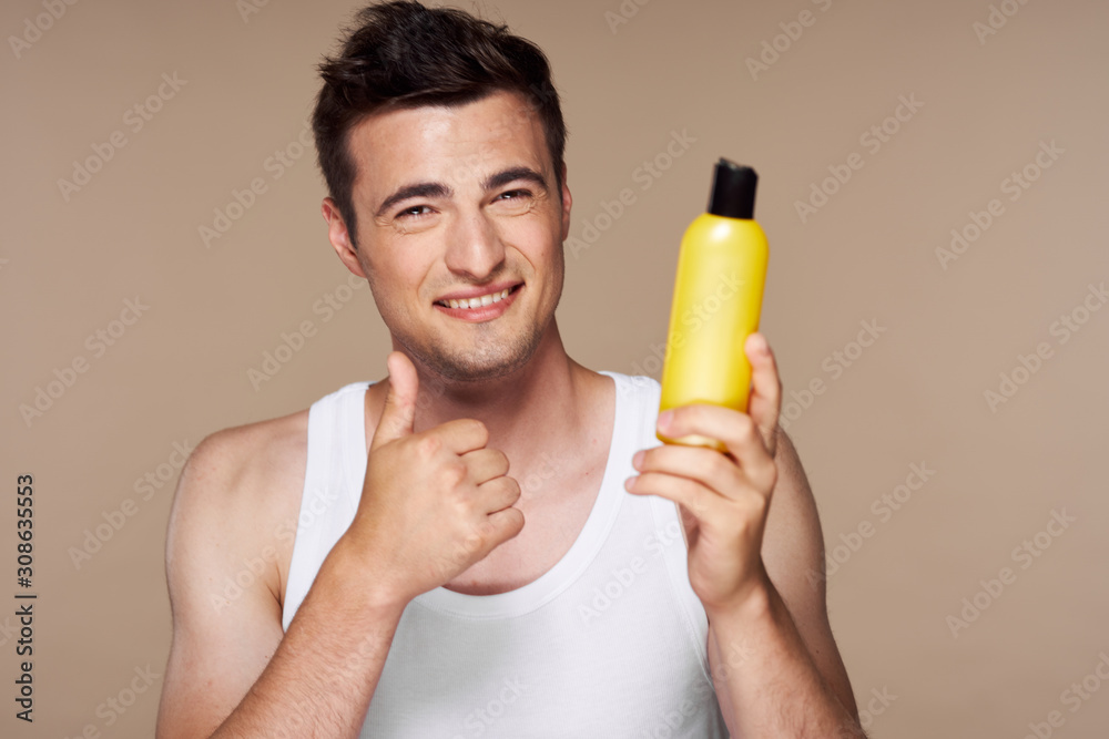 young man drinking orange juice young man drinking orange juice