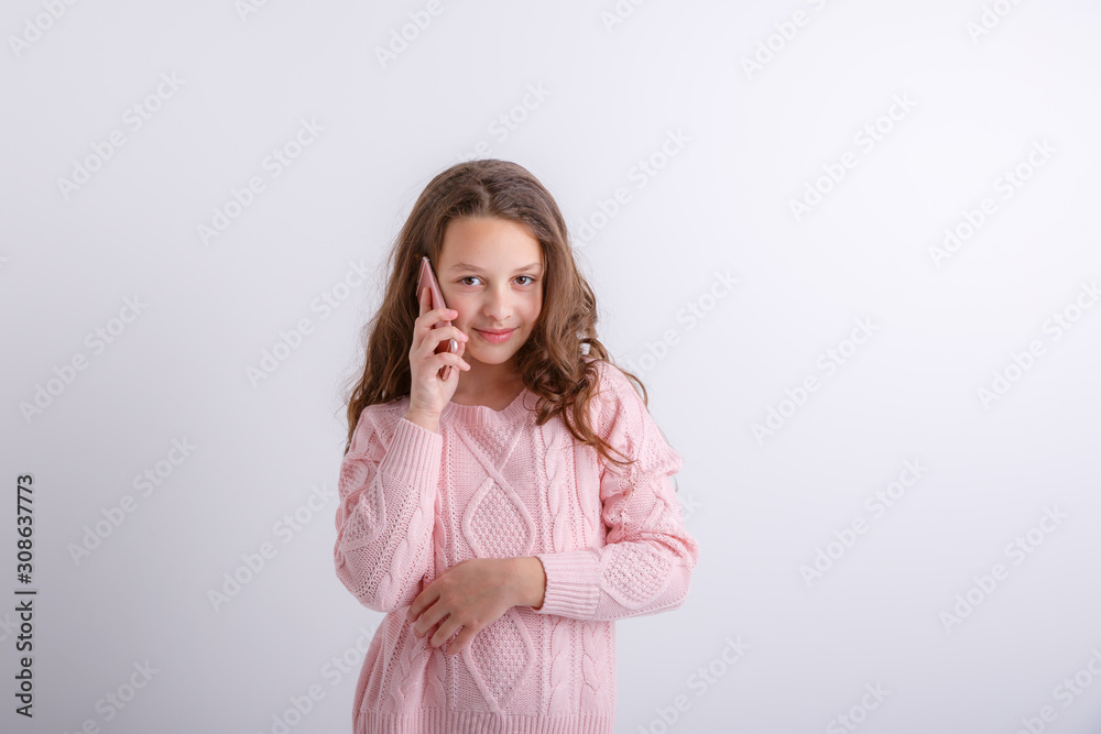 little girl talking on mobile phone isolated on white background little girl talking on mobile phone isolated on white background