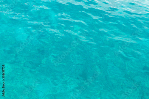 Clear aquamarine ocean water in Tulum, Mexico.