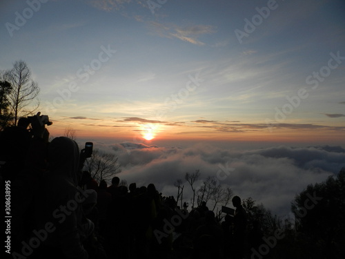 INDONESIA. SEPTEMBER 09, 2014. Camping trip tent on holiday, Adventures Camping tourism and tent with beautiful sunrise in place for camping at Hill Sikunir.
