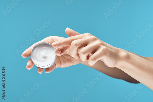 hand holding a glass of water