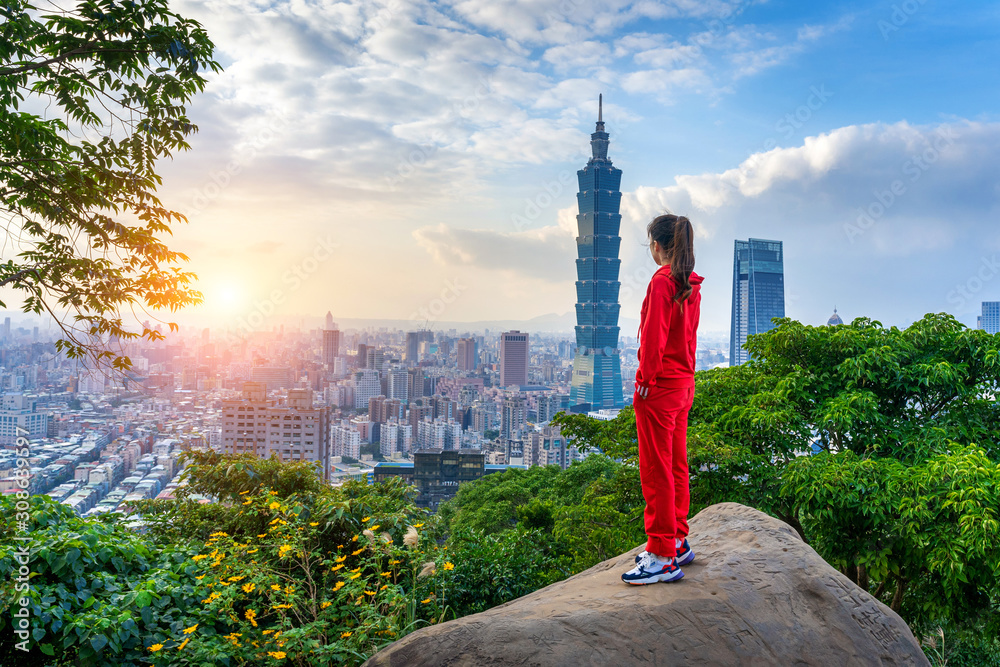 Fototapeta premium Tourist woman enjoying view on mountains in Taipei, Taiwan.