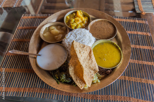 Traditional platter from Assam (Assamese Thali), India photo