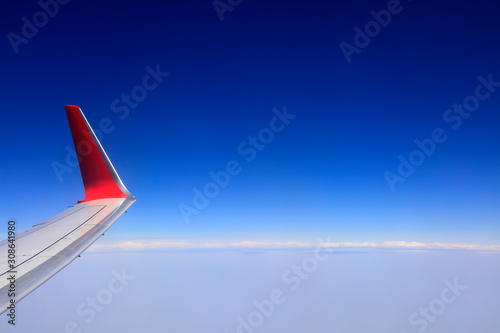 Flight wing in blue sky