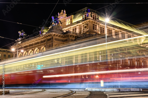 Canvas Print long time exposure of the illuminated Vienna State Opera in Austria at night, li
