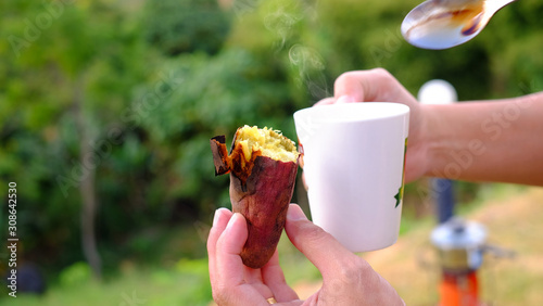 Close up Sweet potatoes burnt and coffree cup delicious menu and photo