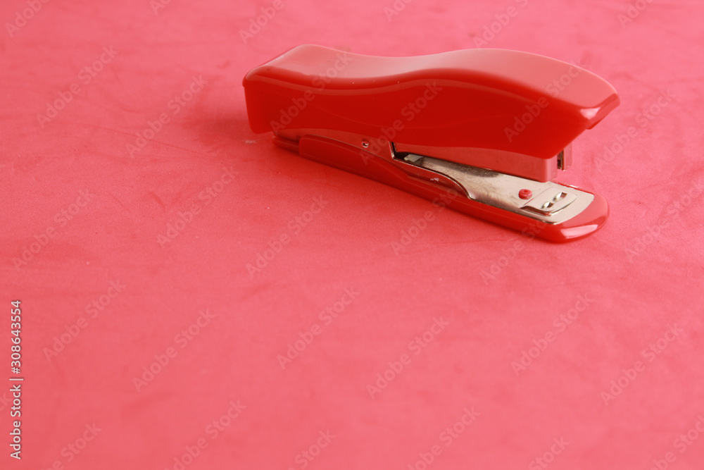 red stapler in color background red stapler in color background