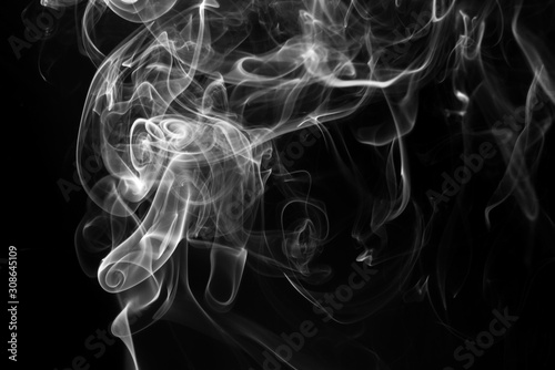 White smoke abstract on black background. fire design. darkness concept