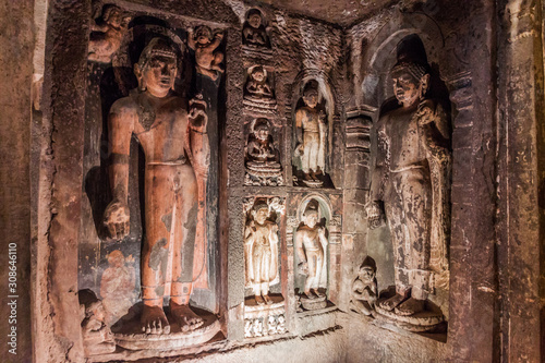 AJANTA, INDIA - FEBRUARY 6, 2017: Buddha images in a monastery (vihara) carved into a cliff in Ajanta, Maharasthra state, India