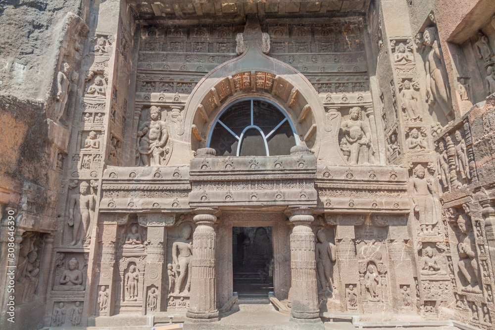 Ornate entrance of the Buddhist chaitya (prayer hall), cave 19, carved into a cliff in Ajanta, Maharasthra state, India
