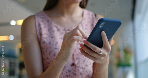 Close up of woman use of mobile phone at outdoor