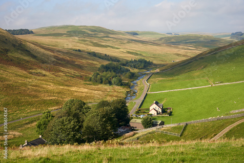Valokuva Farm buildings amongst the hills of Coquetdale countryside in Northumberland, England