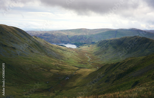 Distant views of Haweswater from the mountain summit of High Street in the Lake District.