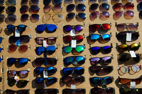 Colourful goggles displayed on the board, Dive Ghat, Maharashtra, India