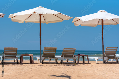 Indian ocean with golden sand  Bentota  Sri Lanka. A wonderful nature landscape of a beach scene.