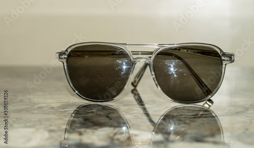 men and women luxury style of fashionable sunglasses   © Ali Magsi
