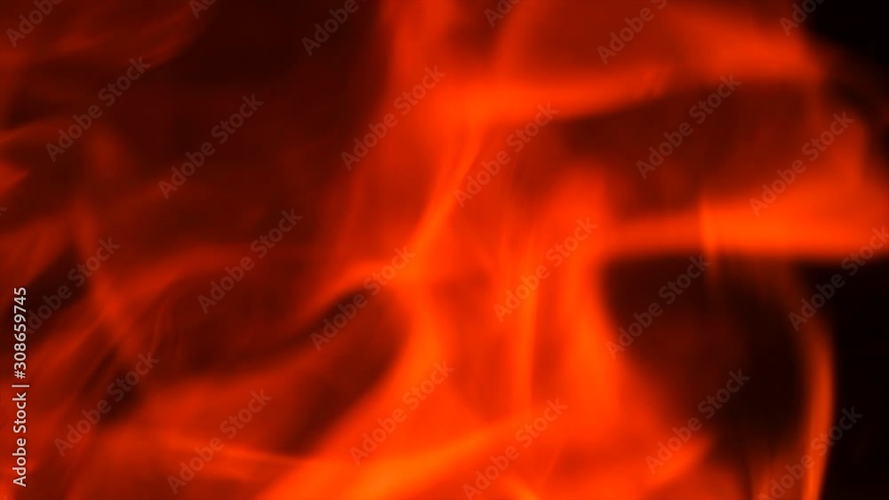 Fire flames with flying sparks background. Firestorm texture, shot of flying fire sparks in the air. Sparks from bonfire backdrop. Slow motion 4K Fire flames with flying sparks background. Firestorm texture, shot of flying fire sparks in the air. Sparks from bonfire backdrop. Slow motion 4K