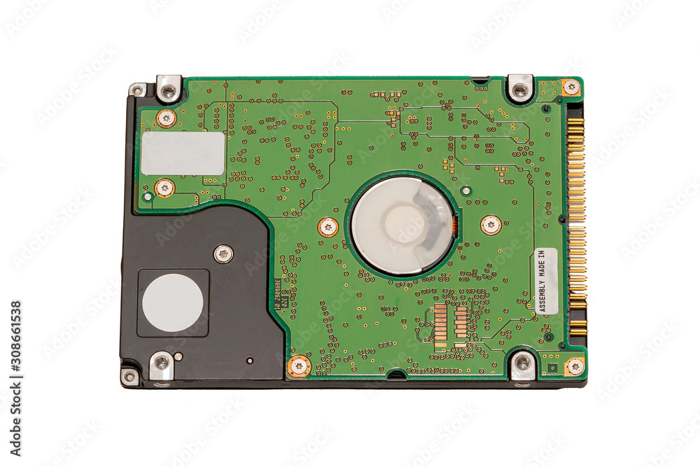 The backplate and the Printed Circuit Board (PCB) of an old IDE 2.5 The backplate and the Printed Circuit Board (PCB) of an old IDE 2.5