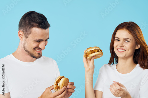 woman with hamburger and french fries