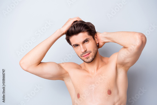 Close up photo of brutal macho man look mirror touch clean hairdo enjoy spa salon anti dander effect isolated over grey color background