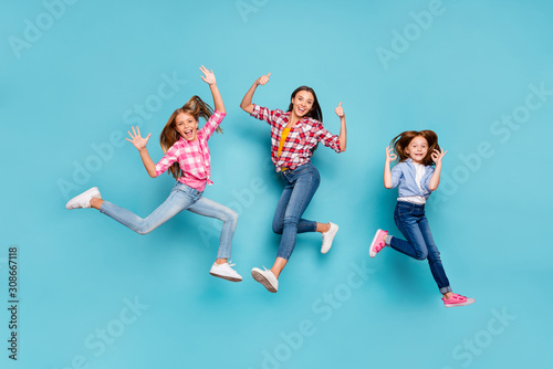 Full length body size photo of white rejoicing overjoyed winning family having given feedback on something wearing jeans denim while isolated with blue background