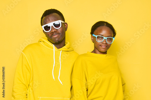 man and woman in sunglasses