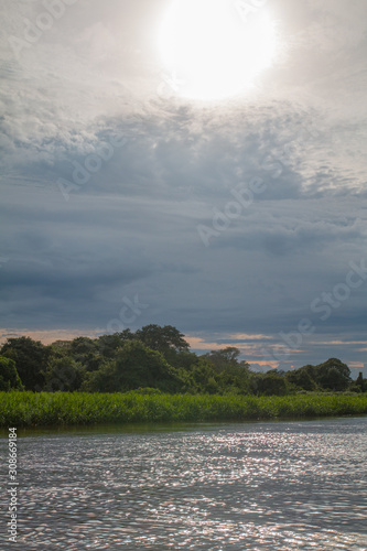 Sunset over miranda river, Panatanal region, Brazil, South America photo