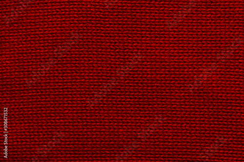 Close up of knit sweater toned red