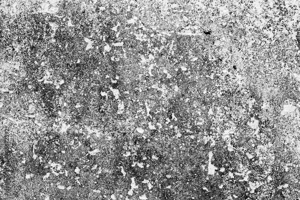 Texture of a concrete wall with cracks and scratches which can be used as a background Texture of a concrete wall with cracks and scratches which can be used as a background
