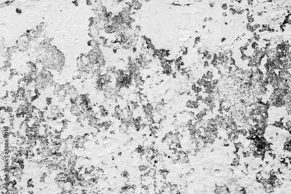 Texture of a concrete wall with cracks and scratches which can be used as a background Texture of a concrete wall with cracks and scratches which can be used as a background