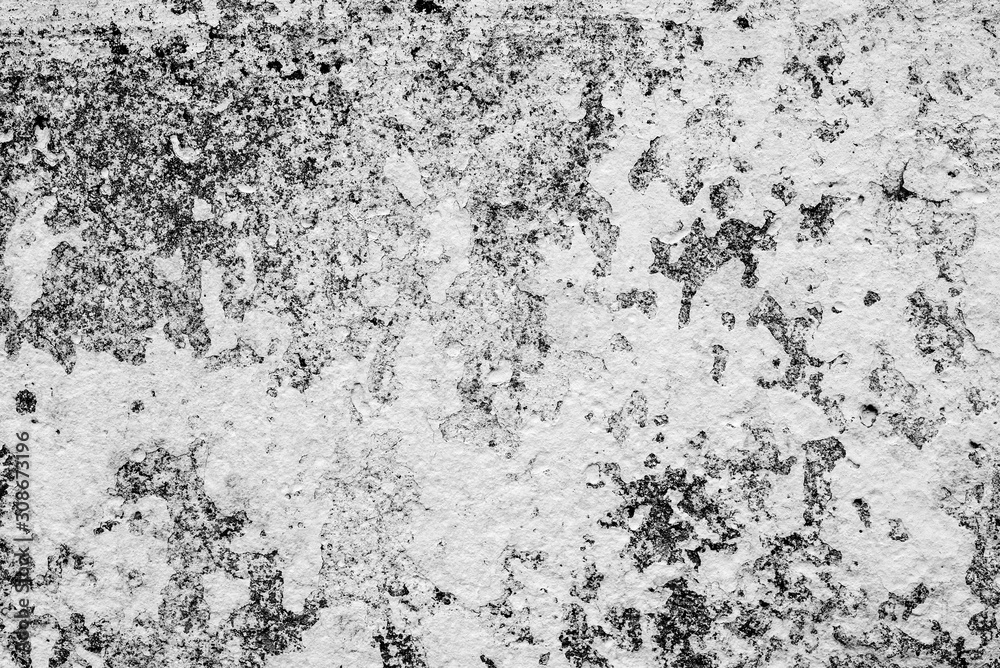 Texture of a concrete wall with cracks and scratches which can be used as a background Texture of a concrete wall with cracks and scratches which can be used as a background
