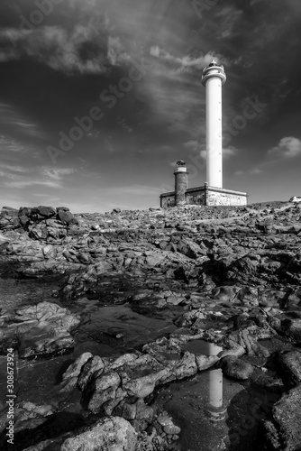 Beautiful black and white view of the lighthouse in Lanzarote called Faro Pechiguera, Canary Islands, Spain